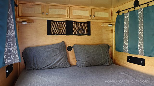 usb-ac outlet installed in back wall of teardrop camper cabin