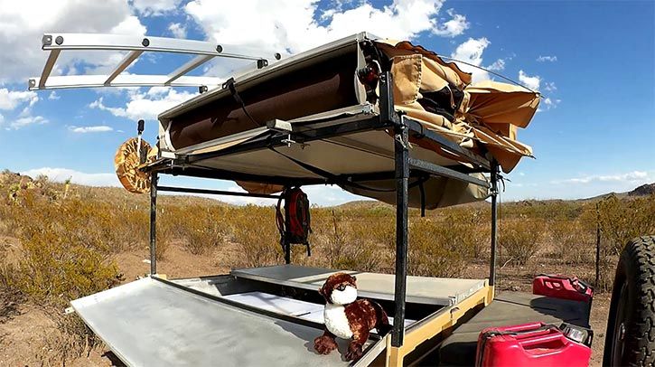 rooftop tent folded up by wind